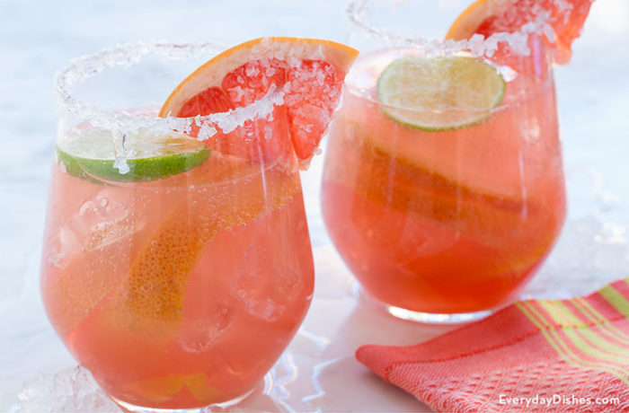 Two glasses of a refreshing Paloma cocktail with grapefruit