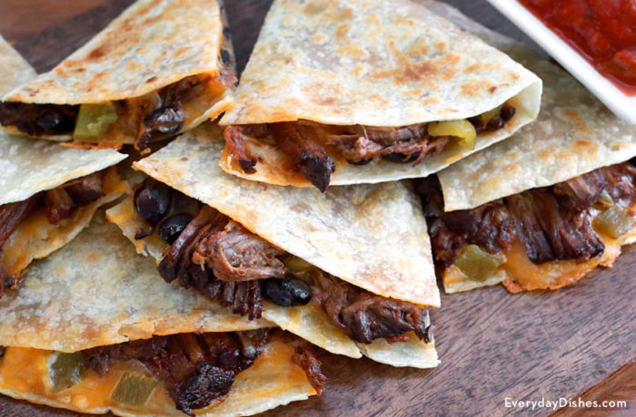 A plate of some delicious slow cooker beef quesadillas.