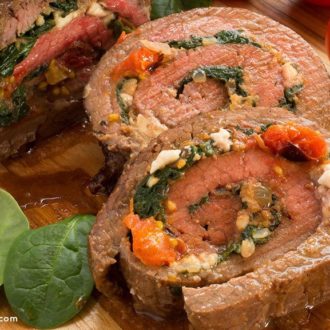 Slices of a delicious stuffed flank steak — the perfect dinner.