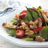 A delicious balsamic strawberry chicken salad on a plate and ready to eat.