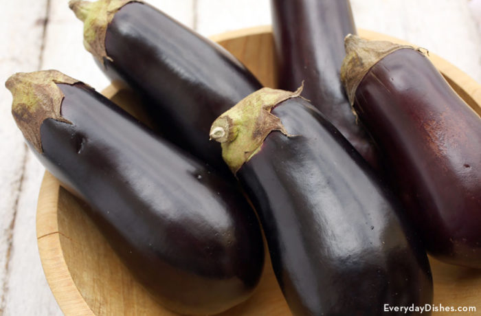 Fresh eggplant that is ready to be roasted.