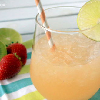 A refreshing kiwi strawberry vodka cocktail.