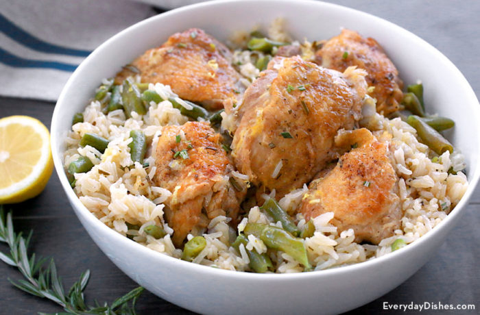 A bowl of a delicious lemon chicken and rice, ready to enjoy for dinner.