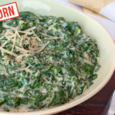 A bowl of einkorn creamed spinach that's ready to serve as a side dish.