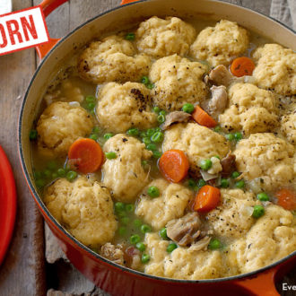 A freshly made pot of chicken and dumplings with einkorn biscuits