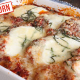 A dish of homemade einkorn chicken parmesan that is ready to serve for dinner.