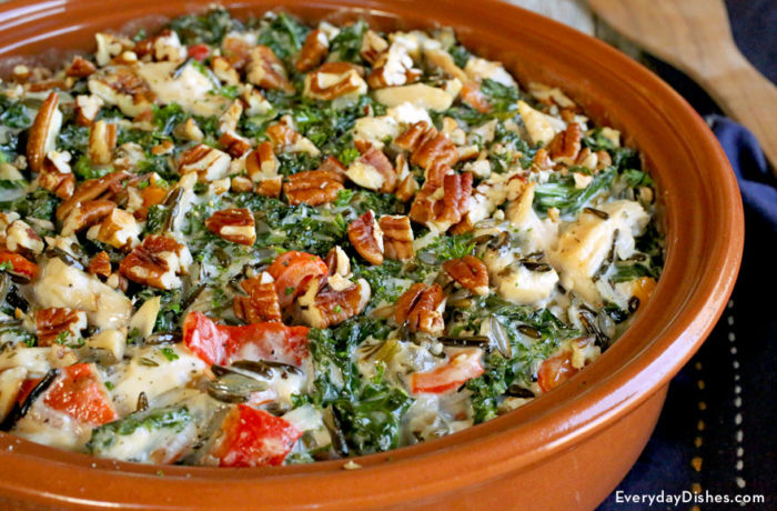 Leftover turkey casserole with kale and wild rice in a dish and ready to eat for dinner.