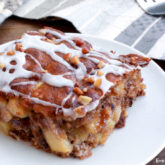 A piece of oatmeal apple breakfast bake, on a plate and ready to enjoy.