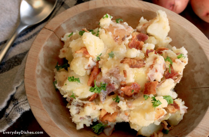 A bowl of delicious smashed red potatoes, a great side dish.