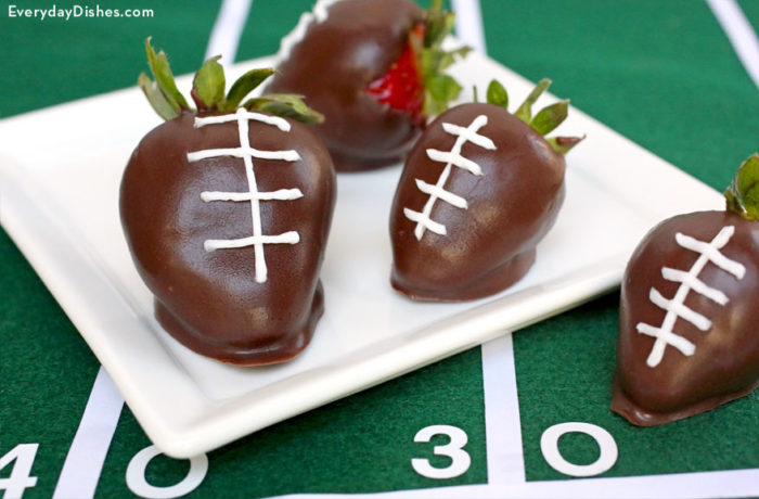 Some homemade chocolate-covered strawberry footballs, a great sweet treat on game day.