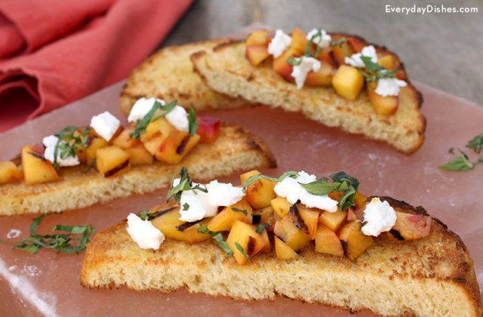 Grilled peaches and goat cheese bruschetta that's ready to serve
