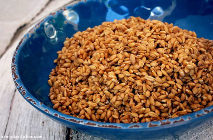 A bowl of wheat berries that are ready to soak.