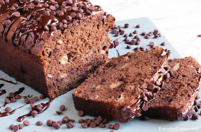 A freshly baked loaf of double chocolate banana bread, sliced and ready to serve.