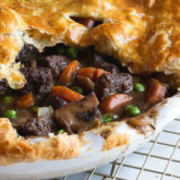 A homemade steak and mushroom pot pie that's ready to serve for dinner.