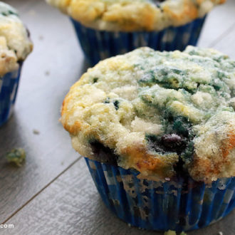 Some freshly baked, moist blueberry muffins.