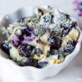 A bowl of delicious blueberry custard, ready to eat.