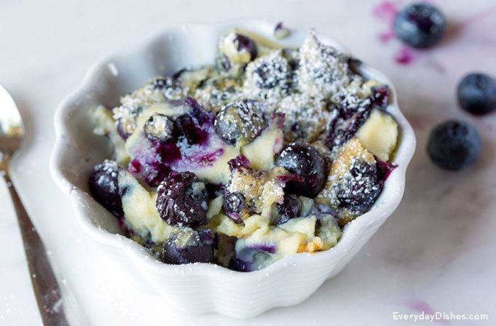 A bowl of delicious blueberry custard, ready to eat.