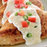 Some freshly made chicken with feta cheese sauce that is ready to serve for dinner.