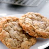 Some homemade oatmeal cookies on a plate.