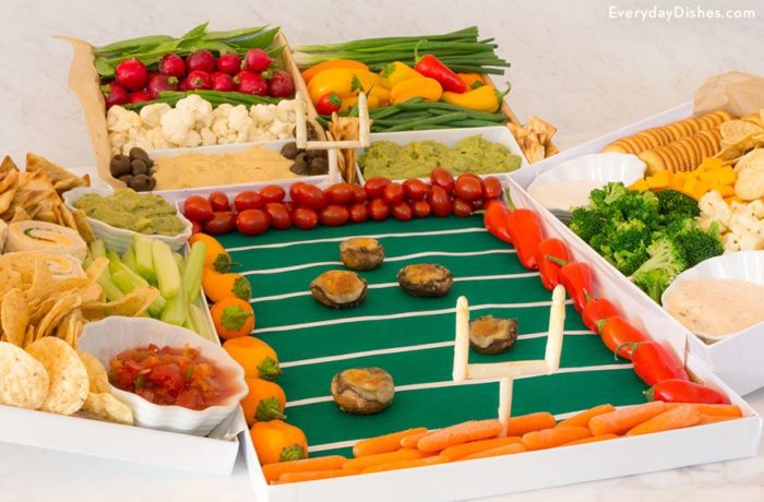 A cute DIY game day vegetable football stadium.