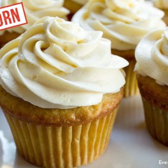 A fresh batch of einkorn yellow cupcakes with vanilla frosting