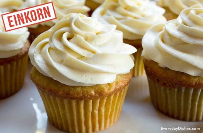 A fresh batch of einkorn yellow cupcakes with vanilla frosting