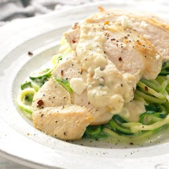 A plate of delicious feta chicken with zoodles, the perfect dinner