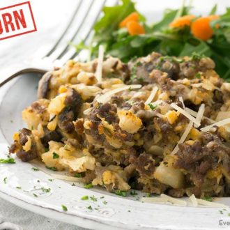 A serving of a low carb einkorn cauliflower hamburger casserole — a healthy and delicious dinner.