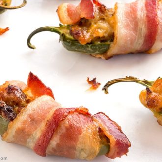 Freshly made bacon-wrapped jalapeño poppers, ready to snack on.
