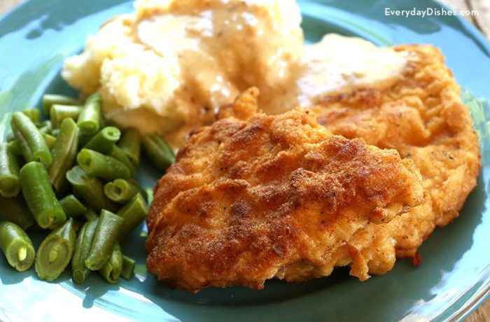 A plate with einkorn fried chicken, green beans, and mashed potatoes — a delicious and healthy dinner!