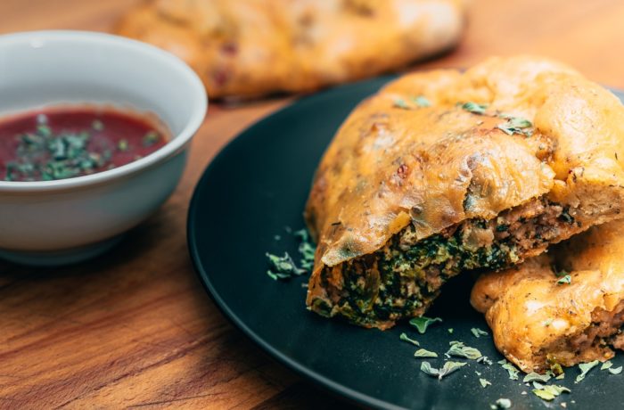 A plate with some homemade easy and delicious calzones.