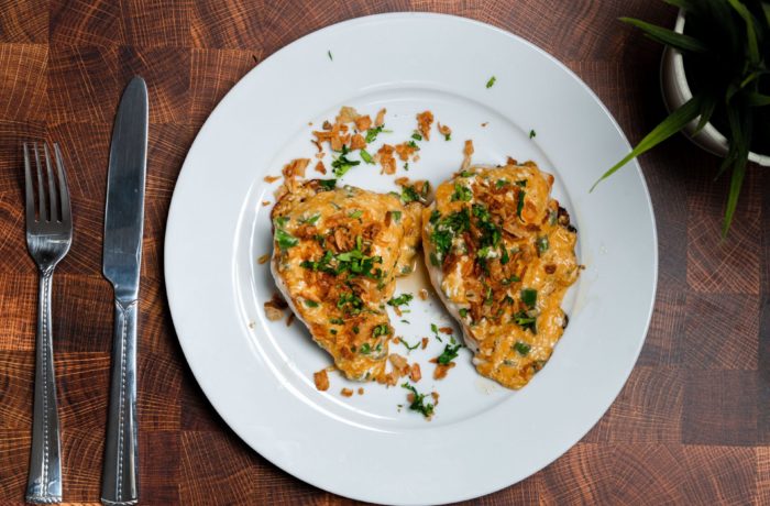 A plate of our quick and easy dinner recipe, jalapeno popper chicken, ready to enjoy.