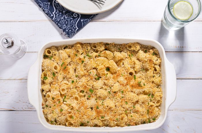 A pan of delicious salmon mac and cheese, fresh out of the oven in time for dinner.