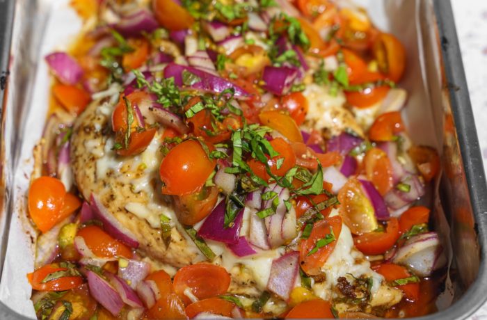 A pan of delicious Kosterina bruschetta chicken, a healthy and easy dinner.
