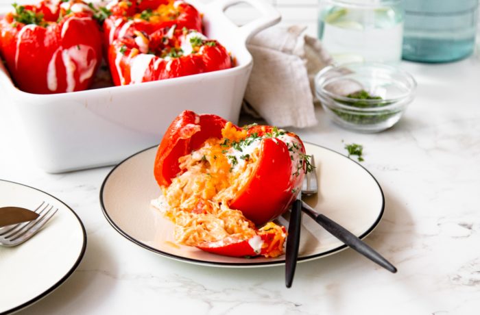 Buffalo chicken stuffed bell peppers, served and ready to enjoy.