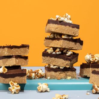Some homemade candy pop Butterfinger bars, stacked on top of each other. A tasty and inventive dessert.
