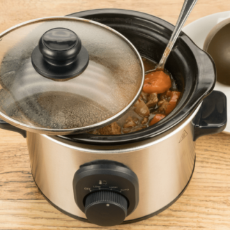 A slow cooker filled with a delicious meal.