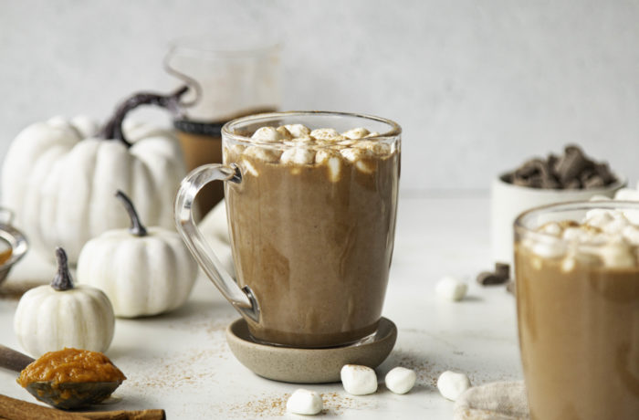 A mug of delicious, homemade pumpkin hot chocolate, topped with marshmallows. A tasty and high protein drink!