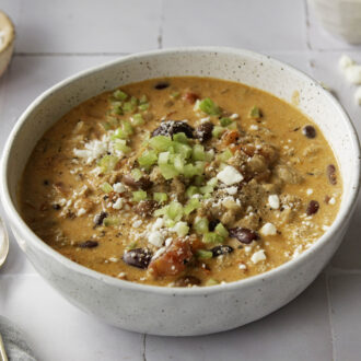 A bowl of creamy buffalo chicken chili, a delicious high-protein soup for dinner.